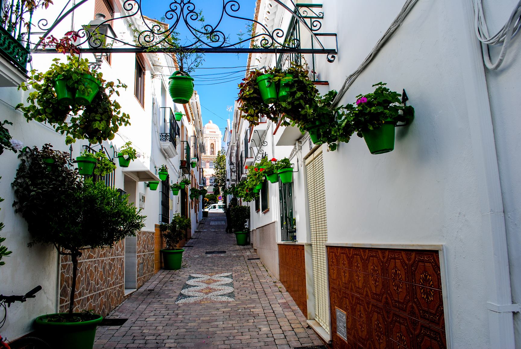 Flower-lined street in Estepona on the Costa del Sol