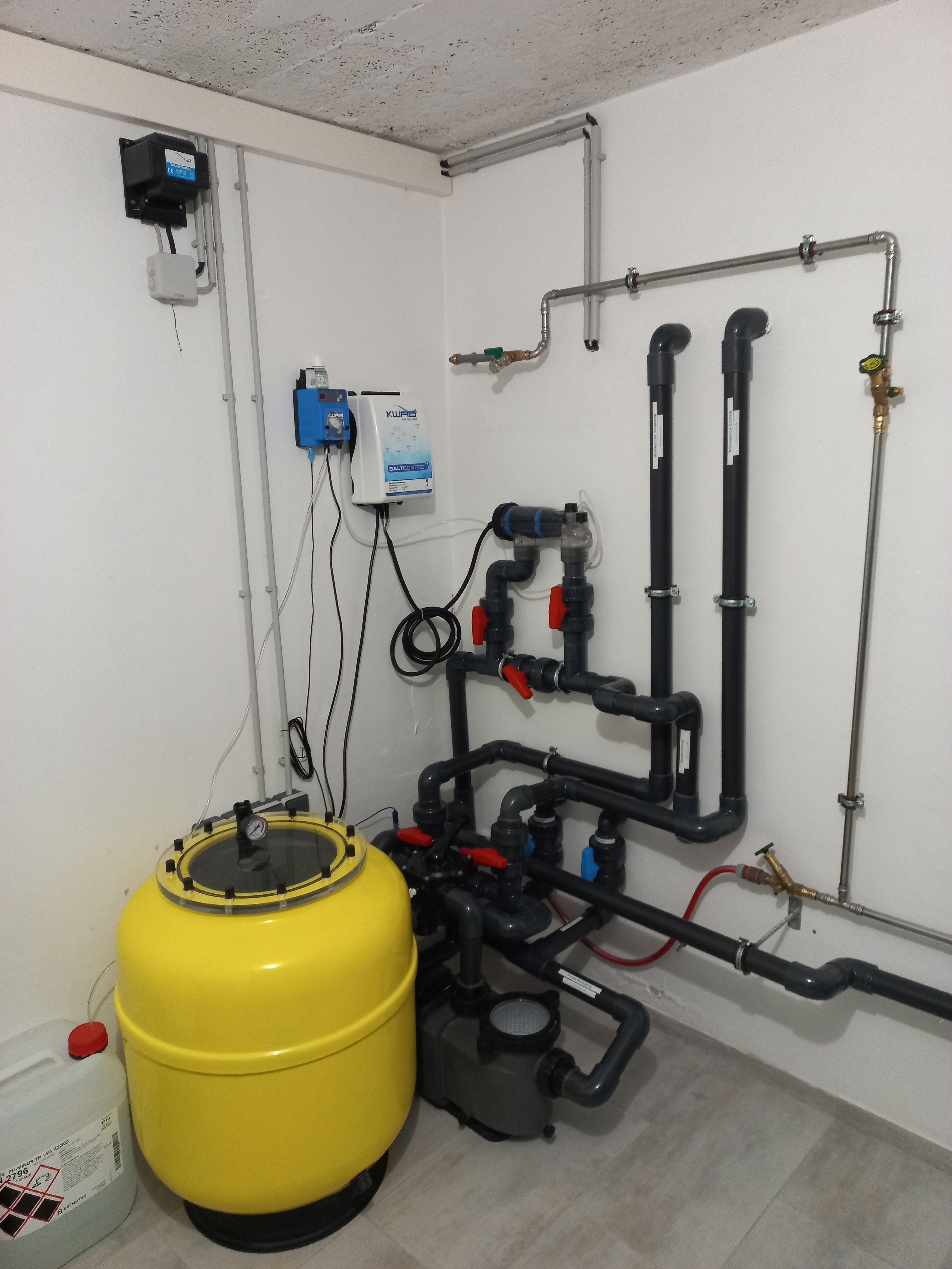 Checking pool filter and pump area in a Marbella home